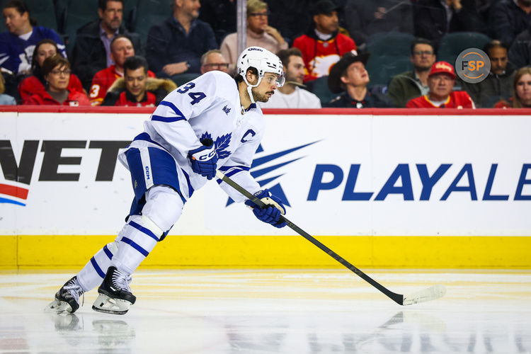 Feb 4, 2025; Calgary, Alberta, CAN; Toronto Maple Leafs center Auston Matthews (34) skates against the Calgary Flames during the second period at Scotiabank Saddledome. Credit: Sergei Belski-Imagn Images