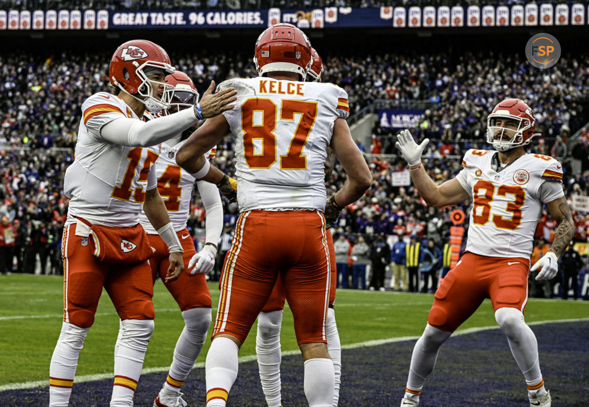 BALTIMORE, MD - JANUARY 28:  Kansas City Chiefs tight end Travis Kelce (87) is congratulated by quarterback Patrick Mahomes (15) and tight end Noah Gray (83) after catching a touchdown pass in the first quarter during the Kansas City Chiefs game versus the Baltimore Ravens in the AFC Championship Game on January 28, 2024 at M&T Bank Stadium in Baltimore, MD.  (Photo by Mark Goldman/Icon Sportswire)