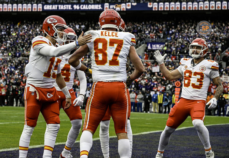 BALTIMORE, MD - JANUARY 28:  Kansas City Chiefs tight end Travis Kelce (87) is congratulated by quarterback Patrick Mahomes (15) and tight end Noah Gray (83) after catching a touchdown pass in the first quarter during the Kansas City Chiefs game versus the Baltimore Ravens in the AFC Championship Game on January 28, 2024 at M&T Bank Stadium in Baltimore, MD.  (Photo by Mark Goldman/Icon Sportswire)