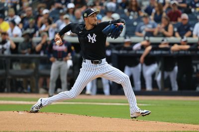 Feb 26, 2026; Tampa, Florida, USA; New York Yankees starting pitcher Elmer Rodriguez (76) throws a pitch against the Atlanta Braves during the first inning at George M. Steinbrenner Field. Mandatory Credit: Kim Klement Neitzel-Imagn Images