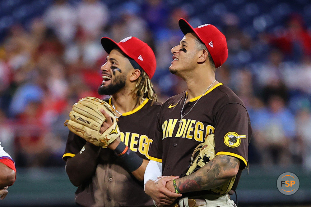 PHILADELPHIA, PA - JULY 03:  San Diego Padres shortstop Fernando Tatis Jr. (23) and San Diego Padres third baseman Manny Machado (13)  during the Major League Baseball game between the Philadelphia Phillies and the San Diego Padres on July 3, 2021 at Citizens Bank Park in Philadelphi, PA.  (Photo by Rich Graessle/Icon Sportswire)