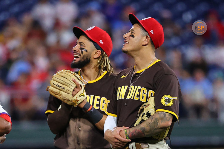 PHILADELPHIA, PA - JULY 03:  San Diego Padres shortstop Fernando Tatis Jr. (23) and San Diego Padres third baseman Manny Machado (13)  during the Major League Baseball game between the Philadelphia Phillies and the San Diego Padres on July 3, 2021 at Citizens Bank Park in Philadelphi, PA.  (Photo by Rich Graessle/Icon Sportswire)