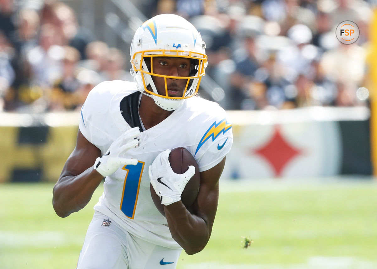 Sep 22, 2024; Pittsburgh, Pennsylvania, USA;  Los Angeles Chargers wide receiver Quentin Johnston (1) runs after a catch against the Pittsburgh Steelers during the second quarter at Acrisure Stadium. Credit: Charles LeClaire-Imagn Images