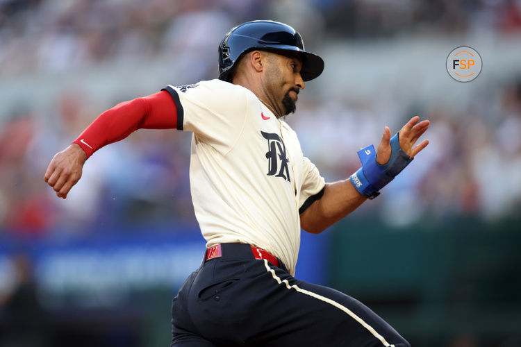 May 30, 2025; Arlington, Texas, USA; Texas Rangers second base Marcus Semien (2) scores a run during the second inning against the St. Louis Cardinals at Globe Life Field. Credit: Tim Heitman-Imagn Images