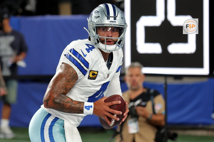 Sep 13, 2026; East Rutherford, New Jersey, USA; Dallas Cowboys quarterback Dak Prescott (4) warms up before a game against the New York Giants at MetLife Stadium. Credit: Brad Penner-Imagn Images