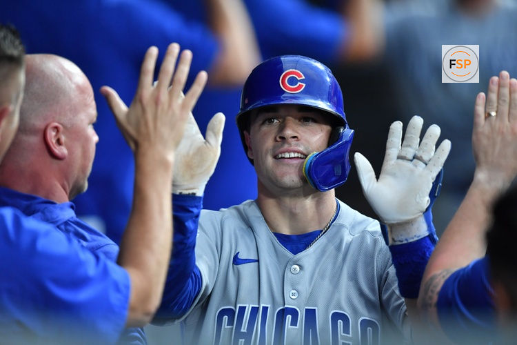 Jul 26, 2025; Chicago, Illinois, USA; Chicago Cubs third baseman Matt Shaw (6) celebrates his two-run home run with teammates in the dugout during the seventh inning against the Chicago White Sox at Rate Field. Credit: Patrick Gorski-Imagn Images