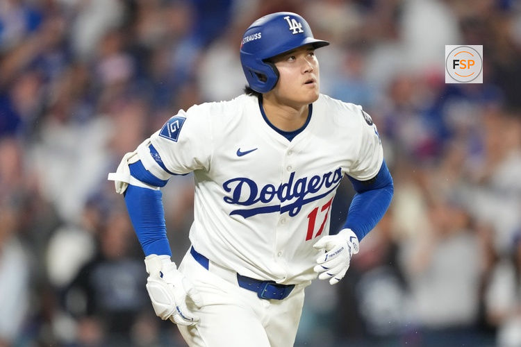 Oct 17, 2025; Los Angeles, California, USA; Los Angeles Dodgers two-way player Shohei Ohtani (17) runs after hitting a solo home run against the Milwaukee Brewers in the fourth inning during game four of the NLCS round for the 2025 MLB playoffs at Dodger Stadium. Credit: Kirby Lee-Imagn Images