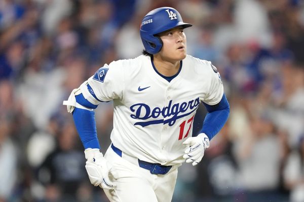 Oct 17, 2025; Los Angeles, California, USA; Los Angeles Dodgers two-way player Shohei Ohtani (17) runs after hitting a solo home run against the Milwaukee Brewers in the fourth inning during game four of the NLCS round for the 2025 MLB playoffs at Dodger Stadium. Mandatory Credit: Kirby Lee-Imagn Images