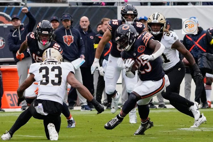Oct 19, 2025; Chicago, Illinois, USA; Chicago Bears running back Kyle Monangai (25) runs the ball against the New Orleans Saints during the first half at Soldier Field. Credit: David Banks-Imagn Images