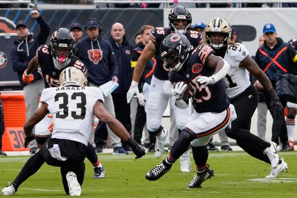 Oct 19, 2025; Chicago, Illinois, USA; Chicago Bears running back Kyle Monangai (25) runs the ball against the New Orleans Saints during the first half at Soldier Field. Mandatory Credit: David Banks-Imagn Images