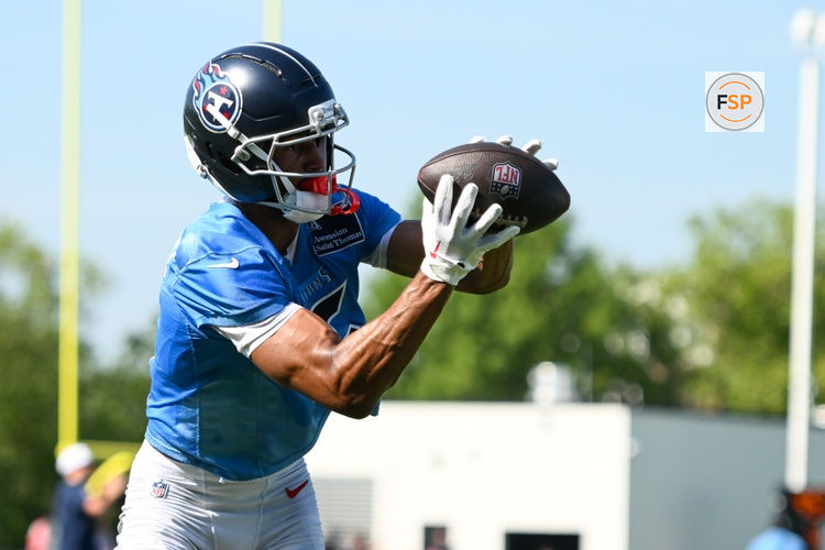 Jul 23, 2025; Nashville, TN, USA;  Tennessee Titans wide receiver Elic Ayomanor (5) makes a catch during training camp at Ascension Saint Thomas Sports Park. Credit: Steve Roberts-Imagn Images