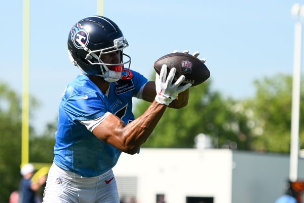 Jul 23, 2025; Nashville, TN, USA;  Tennessee Titans wide receiver Elic Ayomanor (5) makes a catch during training camp at Ascension Saint Thomas Sports Park. Mandatory Credit: Steve Roberts-Imagn Images