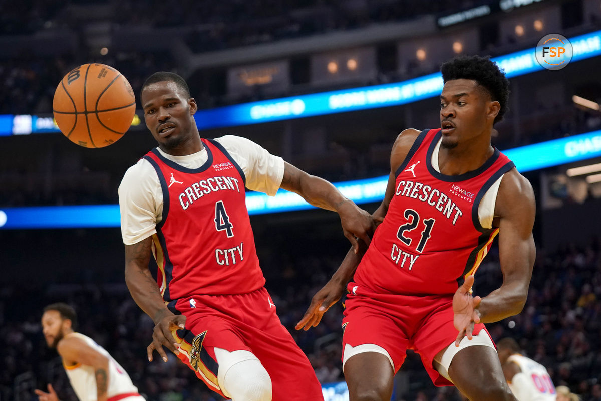 Oct 29, 2024; San Francisco, California, USA; New Orleans Pelicans guard Javonte Green (4) and center Yves Missi (21) look towards the ball during action against the Golden State Warriors in the second quarter at the Chase Center. Credit: Cary Edmondson-Imagn Images