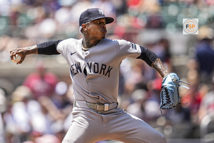 Jul 20, 2025; Cumberland, Georgia, USA; New York Yankees starting pitcher Marcus Stroman (0) pitches against the Atlanta Braves during the first inning at Truist Park. Credit: Dale Zanine-Imagn Images