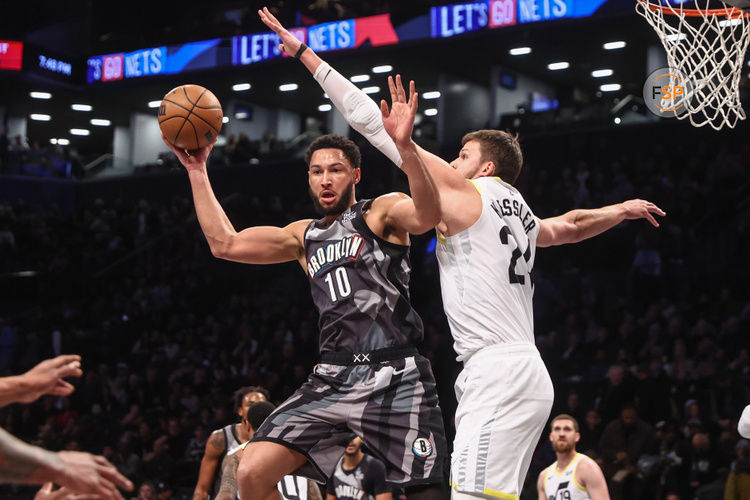 Dec 21, 2024; Brooklyn, New York, USA;  Brooklyn Nets guard Ben Simmons (10) passes the ball against Utah Jazz center Walker Kessler (24) in the first quarter at Barclays Center. Credit: Wendell Cruz-Imagn Images