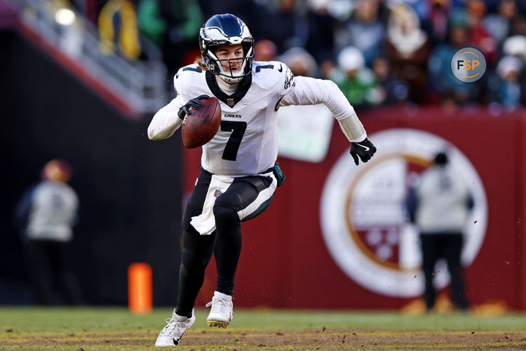 Dec 22, 2024; Landover, Maryland, USA; Philadelphia Eagles quarterback Kenny Pickett (7) runs the ball during the fourth quarter against the Washington Commanders at Northwest Stadium. Credit: Peter Casey-Imagn Images