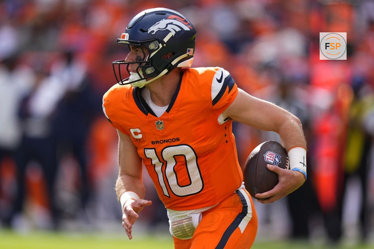 Sep 7, 2025; Denver, Colorado, USA; Denver Broncos quarterback Bo Nix (10) rushes the ball against the Tennessee Titans in the second half at Empower Field at Mile High. Credit: Ron Chenoy-Imagn Images