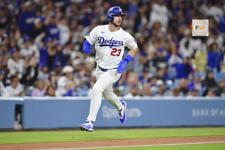May 13, 2026; Los Angeles, California, USA; Los Angeles Dodgers right fielder Kyle Tucker (23) runs home to score in the fourth inning against the San Francisco Giants at Dodger Stadium. Credit: Gary A. Vasquez-Imagn Images