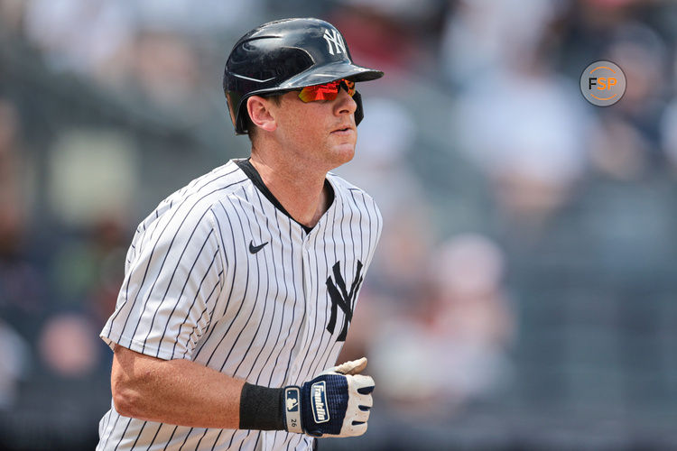 Jul 6, 2024; Bronx, New York, USA; New York Yankees third baseman DJ LeMahieu (26) runs to first during his RBI single during the seventh inning against the Boston Red Sox at Yankee Stadium. Mandatory Credit: Vincent Carchietta-USA TODAY Sports