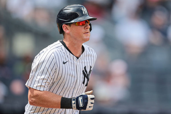 Jul 6, 2024; Bronx, New York, USA; New York Yankees third baseman DJ LeMahieu (26) runs to first during his RBI single during the seventh inning against the Boston Red Sox at Yankee Stadium. Mandatory Credit: Vincent Carchietta-USA TODAY Sports