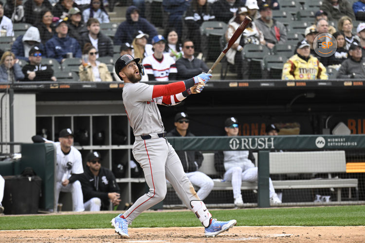Apr 13, 2025; Chicago, Illinois, USA;  Boston Red Sox shortstop Trevor Story (10 )  hits a two RBI double during the sixth inning against the Chicago White Sox at Guaranteed Rate Field. Credit: Matt Marton-Imagn Images