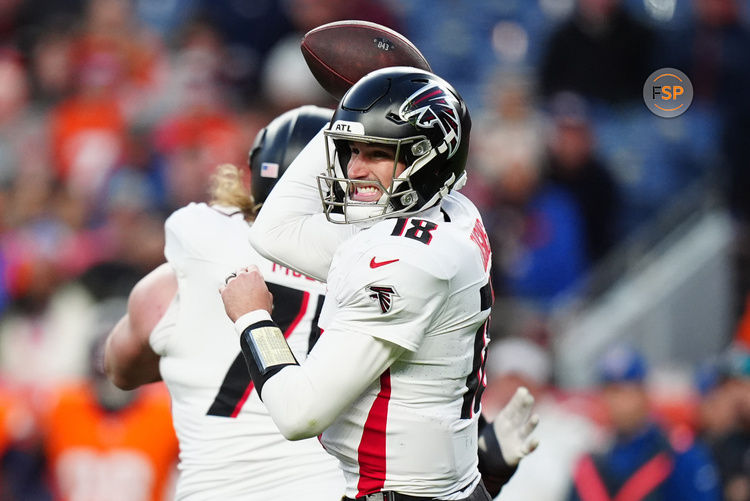 Nov 17, 2024; Denver, Colorado, USA; Atlanta Falcons quarterback Kirk Cousins (18) prepares to pass the ball in the fourth quarter against the Denver Broncos at Empower Field at Mile High. Credit: Ron Chenoy-Imagn Images