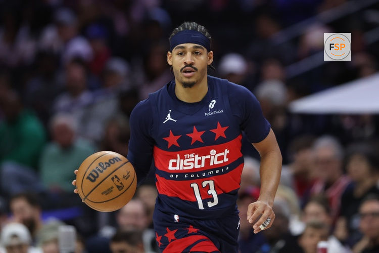 Mar 26, 2025; Philadelphia, Pennsylvania, USA; Washington Wizards guard Jordan Poole (13) dribbles the ball against the Philadelphia 76ers during the first quarter at Wells Fargo Center. Credit: Bill Streicher-Imagn Images