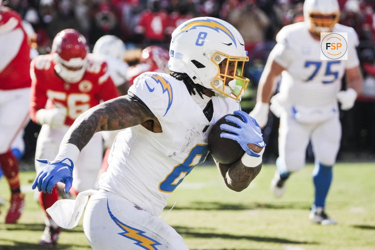 Dec 14, 2025; Kansas City, Missouri, USA; Los Angeles Chargers running back Omarion Hampton (8) runs for yards after the catch against the Kansas City Chiefs during the second quarter at GEHA Field at Arrowhead Stadium. Credit: Denny Medley-Imagn Images