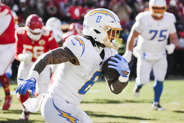 Dec 14, 2025; Kansas City, Missouri, USA; Los Angeles Chargers running back Omarion Hampton (8) runs for yards after the catch against the Kansas City Chiefs during the second quarter at GEHA Field at Arrowhead Stadium. Mandatory Credit: Denny Medley-Imagn Images