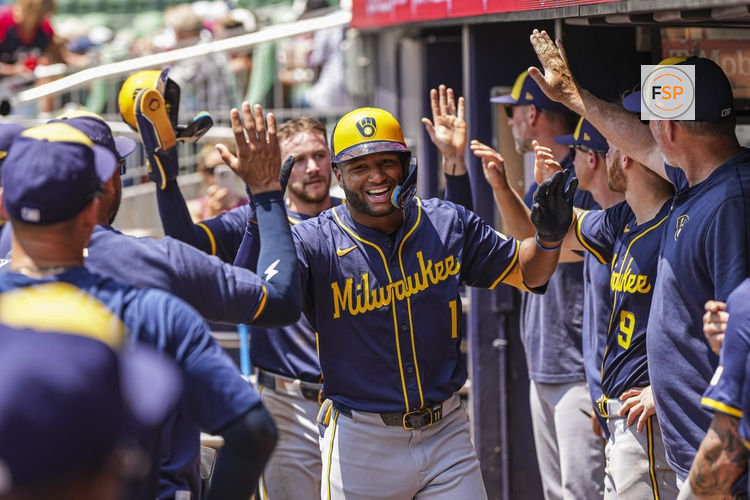 Aug 8, 2024; Cumberland, Georgia, USA; Milwaukee Brewers center fielder Jackson Chourio (11) reacts after hitting a home run against the Atlanta Braves during the fifth inning at Truist Park. Credit: Dale Zanine-USA TODAY Sports