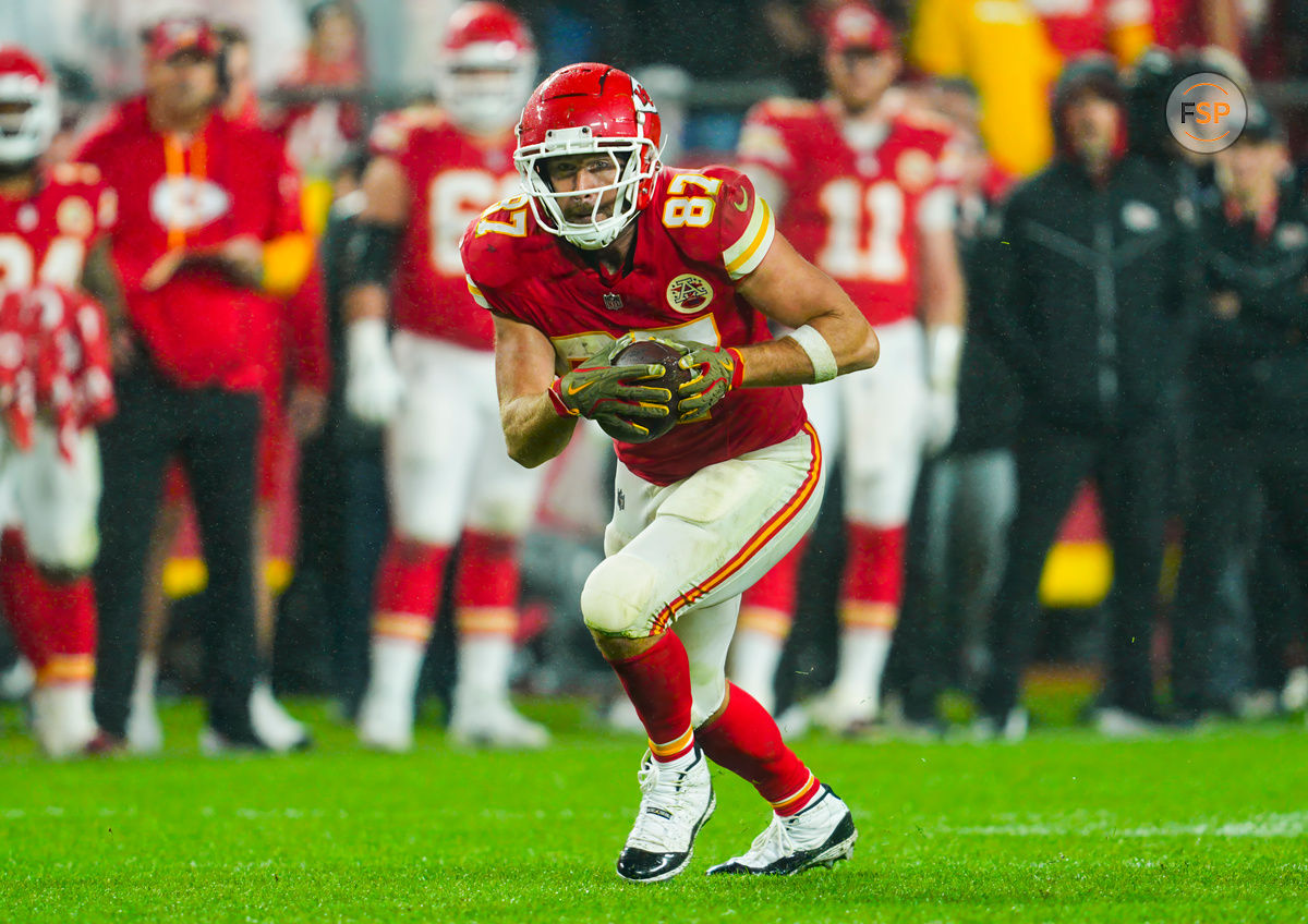 Nov 4, 2024; Kansas City, Missouri, USA; Kansas City Chiefs tight end Travis Kelce (87) runs with the ball during the second half against the Tampa Bay Buccaneers at GEHA Field at Arrowhead Stadium. Credit: Jay Biggerstaff-Imagn Images