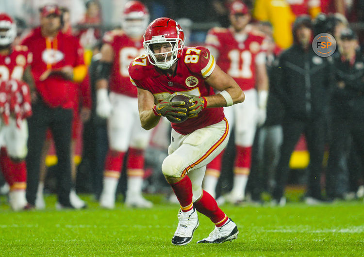 Nov 4, 2024; Kansas City, Missouri, USA; Kansas City Chiefs tight end Travis Kelce (87) runs with the ball during the second half against the Tampa Bay Buccaneers at GEHA Field at Arrowhead Stadium. Credit: Jay Biggerstaff-Imagn Images