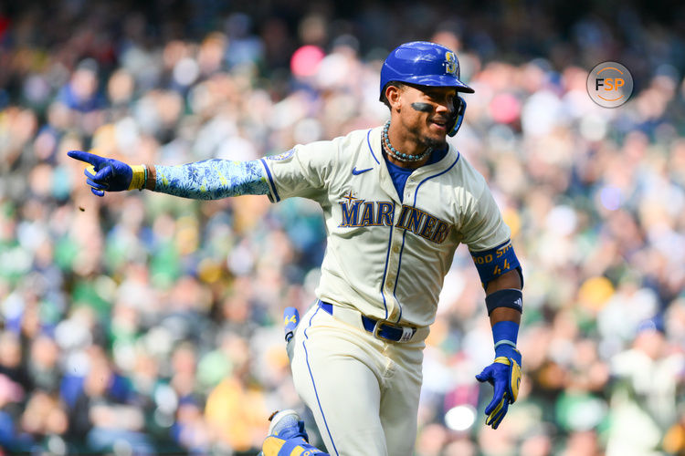 Sep 29, 2024; Seattle, Washington, USA; Seattle Mariners center fielder Julio Rodriguez (44) celebrates after hitting an RBI single against the Oakland Athletics during the fifth inning at T-Mobile Park. Credit: Steven Bisig-Imagn Images
