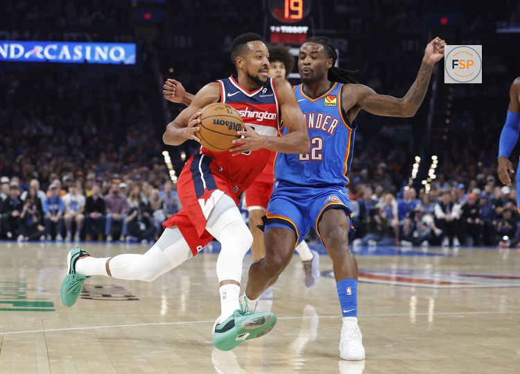 Oct 30, 2025; Oklahoma City, Oklahoma, USA; Washington Wizards guard CJ McCollum (3) drives past Oklahoma City Thunder guard Cason Wallace (22) during the second quarter at Paycom Center. Credit: Alonzo Adams-Imagn Images