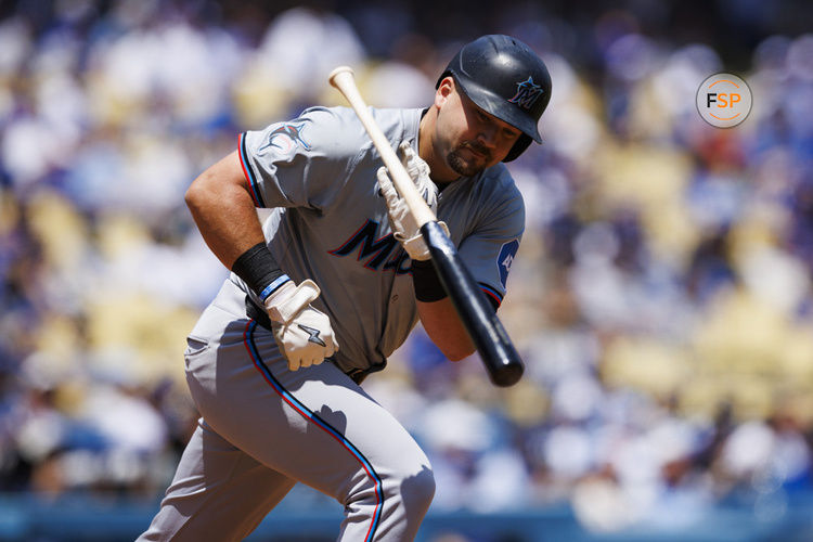 LOS ANGELES, CA - MAY 08: Miami Marlins first base Jake Burger (36) tosses his bat during an MLB baseball game against the Los Angeles Dodgers on May 8, 2024 at Dodger Stadium in Los Angeles, CA. (Photo by Ric Tapia/Icon Sportswire)