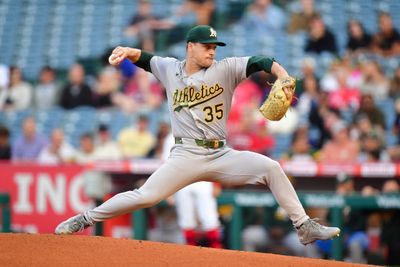 May 18, 2026; Anaheim, California, USA; Athletics pitcher J.T. Ginn (35) throws against the Los Angeles Angels during the first inning at Angel Stadium. Mandatory Credit: Gary A. Vasquez-Imagn Images