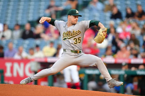 May 18, 2026; Anaheim, California, USA; Athletics pitcher J.T. Ginn (35) throws against the Los Angeles Angels during the first inning at Angel Stadium. Mandatory Credit: Gary A. Vasquez-Imagn Images