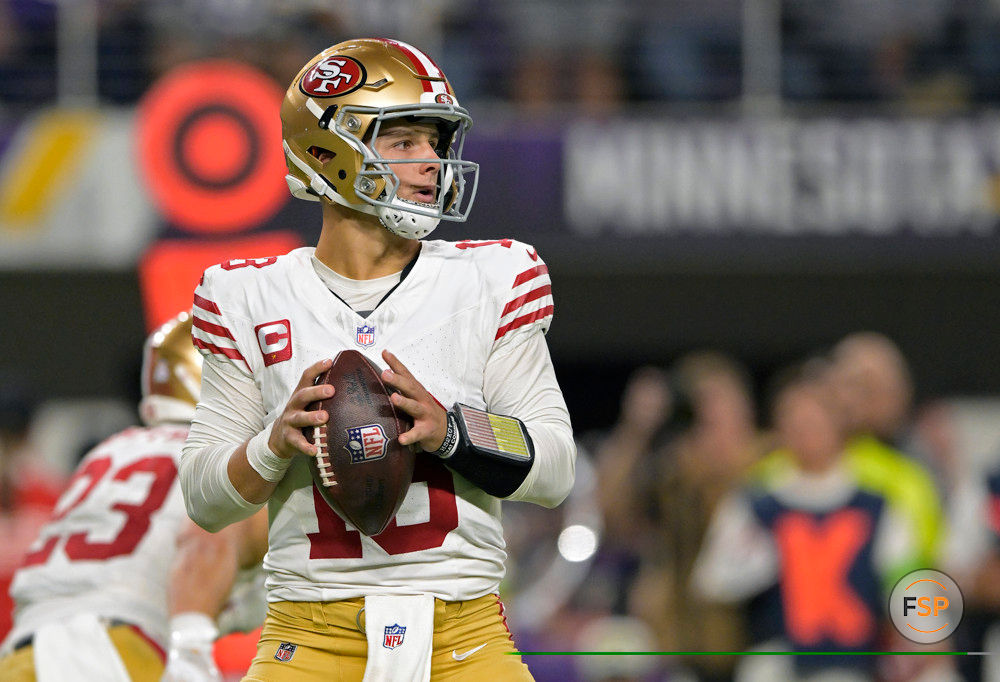 MINNEAPOLIS, MN - OCTOBER 23: San Francisco 49ers quarterback Brock Purdy (13) looks to pass during an NFL game between the Minnesota Vikings and San Francisco 49ers on October 23, 2023, at U.S. Bank Stadium in Minneapolis, MN.(Photo by Nick Wosika/Icon Sportswire)
