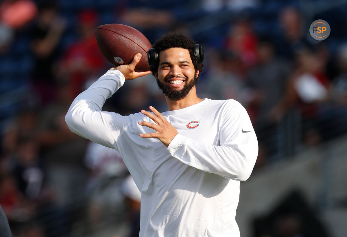 Aug 1, 2024; Canton, Ohio, USA;  Chicago Bears quarterback Caleb Williams (18) warms up before the game against the Houston Texans at Tom Benson Hall of Fame Stadium. Mandatory Credit: Charles LeClaire-USA TODAY Sports