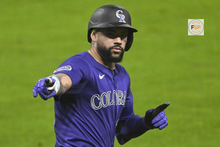 Jul 28, 2025; Cleveland, Ohio, USA; Colorado Rockies first baseman Warming Bernabel (25) celebrates his solo home run in the sixth inning against the Cleveland Guardians at Progressive Field. Credit: David Richard-Imagn Images