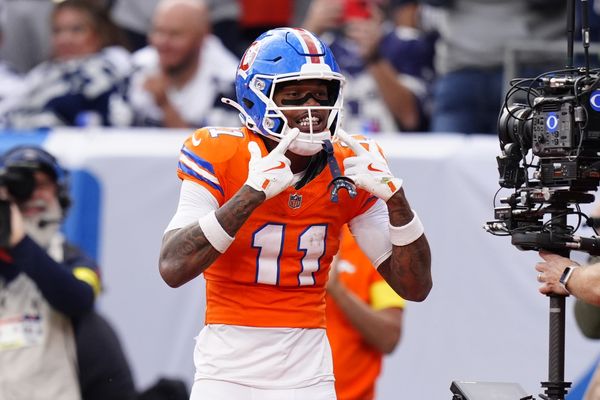 Oct 26, 2025; Denver, Colorado, USA;  Denver Broncos wide receiver Troy Franklin (11) celebrates after scoring a touchdown against the Dallas Cowboys in the fourth quarter at Empower Field at Mile High. Mandatory Credit: Ron Chenoy-Imagn Images