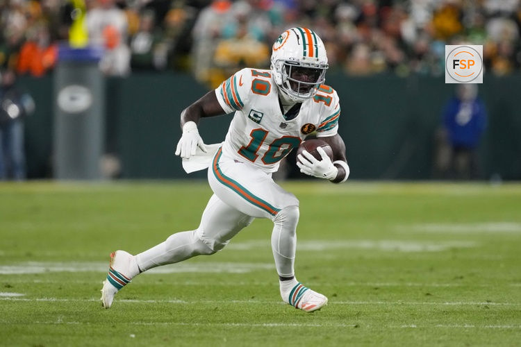 Nov 28, 2024; Green Bay, Wisconsin, USA;  Miami Dolphins wide receiver Tyreek Hill (10) during the game against the Green Bay Packers at Lambeau Field. Credit: Jeff Hanisch-Imagn Images