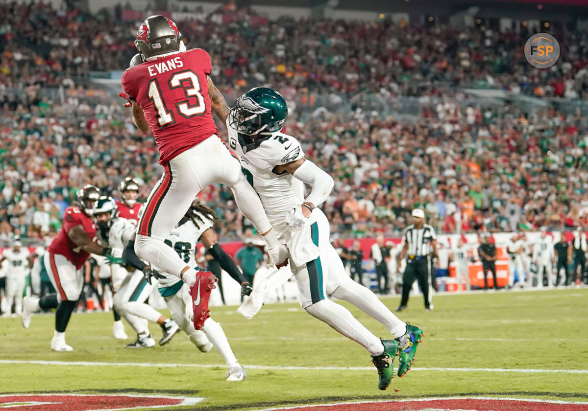 TAMPA, FL - SEPTEMBER 25: Tampa Bay Buccaneers wide receiver Mike Evans (13) catches the ball for a touchdown during the NFL Football match between the Tampa Bay Buccaneers and Philadelphia Eagles on September 25, 2023, at Raymond James Stadium in Tampa, FL. (Photo by Andrew Bershaw/Icon Sportswire)
