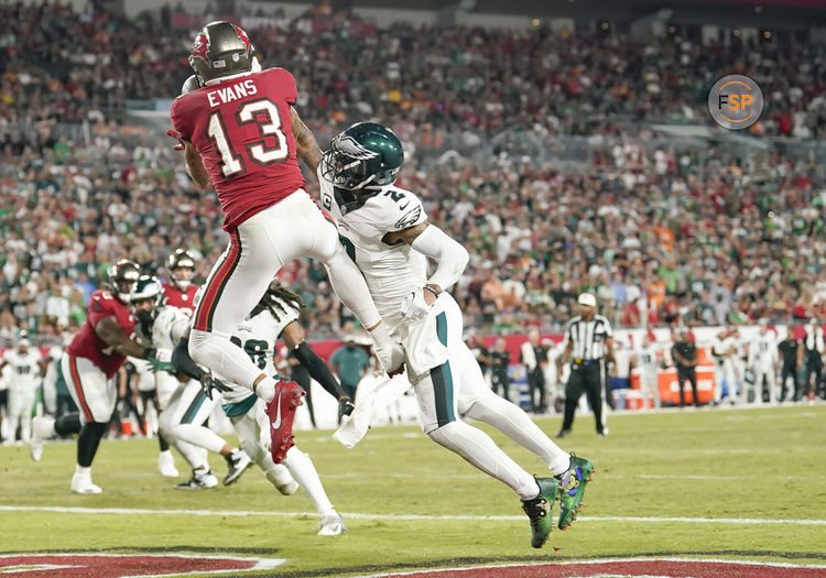 TAMPA, FL - SEPTEMBER 25: Tampa Bay Buccaneers wide receiver Mike Evans (13) catches the ball for a touchdown during the NFL Football match between the Tampa Bay Buccaneers and Philadelphia Eagles on September 25, 2023, at Raymond James Stadium in Tampa, FL. (Photo by Andrew Bershaw/Icon Sportswire)
