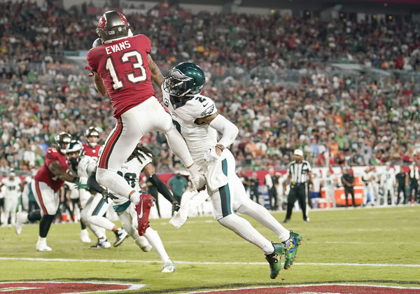 TAMPA, FL - SEPTEMBER 25: Tampa Bay Buccaneers wide receiver Mike Evans (13) catches the ball for a touchdown during the NFL Football match between the Tampa Bay Buccaneers and Philadelphia Eagles on September 25, 2023, at Raymond James Stadium in Tampa, FL. (Photo by Andrew Bershaw/Icon Sportswire)
