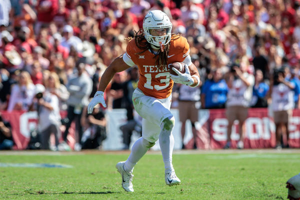 DALLAS, TX - OCTOBER 07: Texas Longhorns wide receiver Jordan Whittington (13) runs the ball during the second half against the Oklahoma Sooners on October 7th, 2023 at Cotton Bowl Stadium in Dallas Texas. (Photo by William Purnell/Icon Sportswire)