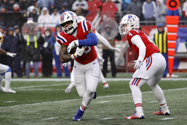 FOXBOROUGH, MA - DECEMBER 03: New England Patriots running back Ezekiel Elliott (15) carries during a game between the New England Patriots and the Los Angeles Chargers on December 3, 2023, at Gillette Stadium in Foxborough, Massachusetts. (Photo by Fred Kfoury III/Icon Sportswire)