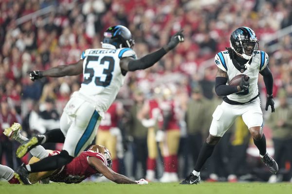 Nov 24, 2025; Santa Clara, California, USA; Carolina Panthers cornerback Jaycee Horn (8) catches an interception against the San Francisco 49ers during the first half at Levi's Stadium. Mandatory Credit: Kyle Terada-Imagn Images