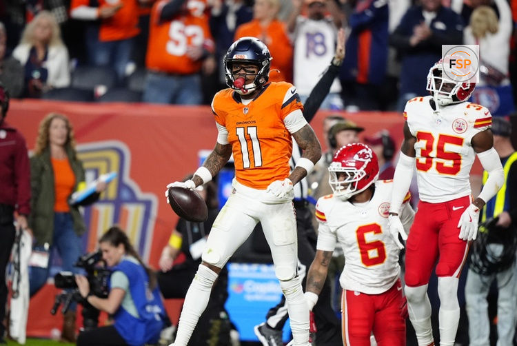 Nov 16, 2025; Denver, Colorado, USA; Denver Broncos wide receiver Troy Franklin (11) reacts after a first down in the fourth quarter against the Kansas City Chiefs at Empower Field at Mile High. Credit: Ron Chenoy-Imagn Images
