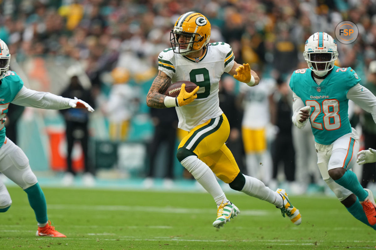 MIAMI GARDENS, FL - DECEMBER 25: Green Bay Packers wide receiver Christian Watson (9) runs after the catch in the first half during the game between the Green Bay Packers and the Miami Dolphins on Sunday, December 25, 2022 at Hard Rock Stadium, Miami Gardens, Fla. (Photo by Peter Joneleit/Icon Sportswire)